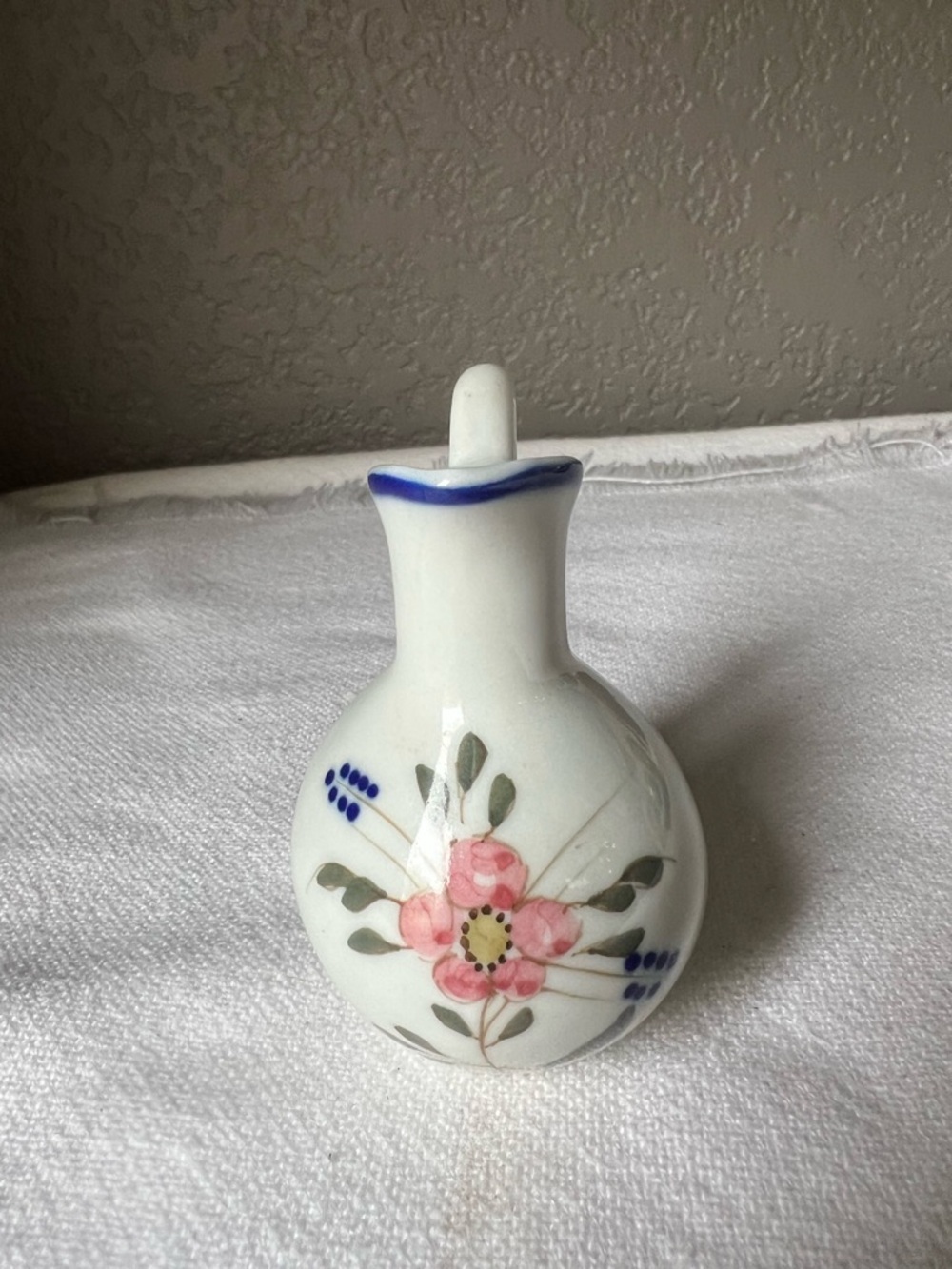 White Ceramic Floral Bud Vase with Pink Flower Accent